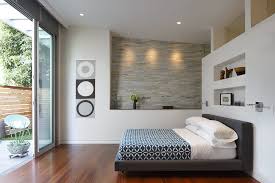 Although midcentury modern design is mostly clean and without excessive ornamentation, one exception to that rule is the use of angular or unusual light fixtures, particularly atomic styled fixtures, as seen in the beachy modern bedroom from amy lau design shown here. Modern Small Master Bedroom Design Ideas Novocom Top
