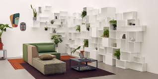 Like a building block toy, this modular bookcase allows the user to create shelves with limitless shapes and dimensions. Shelving System I Cubit