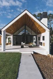 Sur Le Cote De La Maison Prolongement Toiture Mur Protege Du Vent Canopy Outdoor Canopy Design House Exterior
