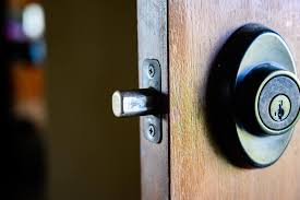 Insert a very thin screwdriver into the hole in the middle of the doorknob. How To Open A Deadbolt Lock With A Screwdriver Do This Upgraded Home