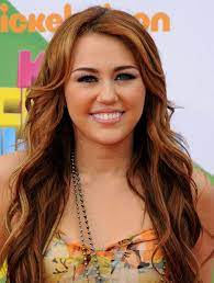 The girl who put herself on the map for taking on a double life by putting on a wig. Miley Cyrus Hairstyles Weekly