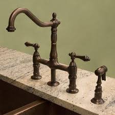 Are you trying to create a classic ambiance in your kitchen? Bellevue Bridge Kitchen Faucet With Brass Sprayer Lever Handles Oil Rubbed Bronze By Nottingham Brass Http Kitchen Faucet Kitchen Hardware Kitchen Handles