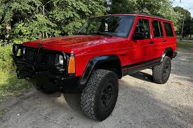 Image result for Flame Red 1995 Jeep