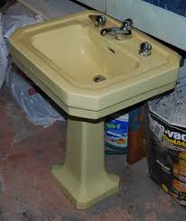 sebastian scores a yellow pedestal sink