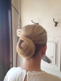 The hair can be parted in the middle, on one side, or brushed straight back with no visible part. Chignon Hairstyle Wikipedia