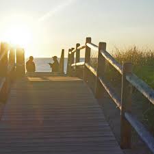 Image result for two people hugging on a bridge