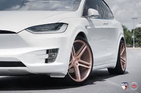 The first white one is pearl white, the second is regular white. White Tesla Model X Sits On Gold Vossen Forged Wheels Autoevolution