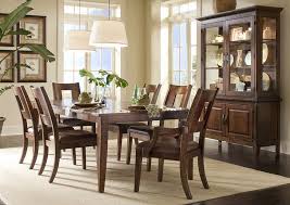 The right materials from a glass dining table that's modern and easy to clean to a sturdy wood kitchen table with bench that adds rustic flair, the right choice is the one. Carturra Dining Table W 4 Side Chairs 2 Arm Chairs Buffet Hutch Living Room Center