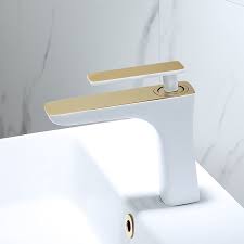 A gold finish bathroom faucet can work in almost any setting, including those full of cool tones like navy and white. Single Handle Bathroom Faucet Gold White Black Vessel Sink Brass Faucet Waterfall Modern