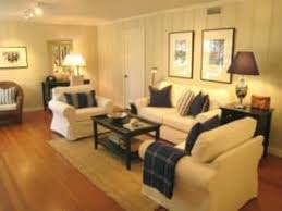 A deglosser is wiped onto the paneling, acting as a liquid sandpaper so the paint will stick. How To Paint Wood Paneled Walls And Shiplap The Flooring Girl