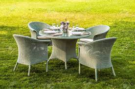 See out range of dining sets, tables, and more online or in store today! White Rattan Furniture Table Chairs And Cushion Outdoors In Stock Photo Picture And Royalty Free Image Image 61491400