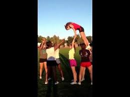 Front Flip To Cradle Cheerleading Stunt Cheerleading Stunt Cheer Stunts Cool Cheer Stunts