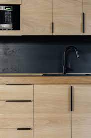 We Kept The Existing Kitchen Cabinet Bodies And Replaced The Kitchen Faces With Dead Black Kitchen Cabinets Kitchen Door Handles Kitchen Cupboard Handles