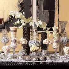 Black And Gold Candy Bar How To Create A Sweet And Stunning Candy Buffet Wedding Candy Gold Candy Buffet Candy Buffet Wedding