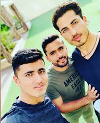 Mujeeb Zadran With Zahir Khan And Sharafuddin Ashraf Couple Photos Photo Handsome