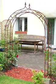 I have planted one on each side of the path so in time they will create a canopy that you can walk under. Rosenbogen Aus Schmiedeeisen Mit Tor Verzinkt Und Rostig