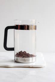 Step 2 strain coffee through a coffee filter in a small strainer. How To Make Cold Brew Coffee In A French Press Step By Step The Wooden Skillet