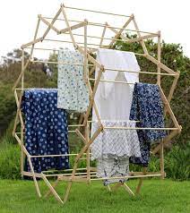 Once all of the holes are drilled, assemble three sides of the frame… the top, bottom and one of the sides. 11 Diy Functional Laundry Racks For Every Space Shelterness