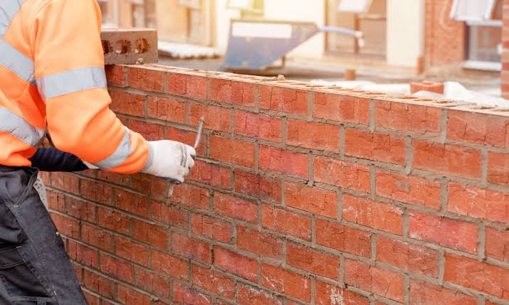 Brick wall and masonry pointing