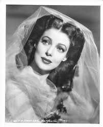 Sharing a few shots of LY in costumes from "The Men in Her Life" are over  the top the costume designer Charles Le Maire was a genius!