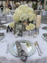 Very Elegant Tablescape With Minimal Color Mirror Charger Plates And A Textured Table Cloth Silver Charger Plates Elegant Table Settings Charger Plates