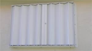 Hurricane shutters are used to prevent windows from being broken by flying objects during a storm. Accordion Hurricane And Storm Shutters Tropical Storm Shield
