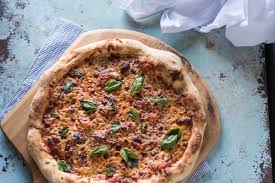 The Best Pizza Dough Chewy Thin Crust With A Puffy Rim Blossom To Stem