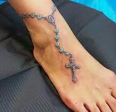 Love pink rosary tattoo on foot for girls. I Usually Don T Care For Rosary Tats Don T Know Why But This One Is Really Pretty Foot Tattoo Rosary Foot Tattoos Rosary Ankle Tattoos Anklet Tattoos