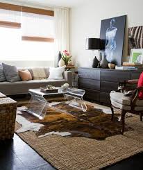 How to lay an area rug over carpet flooring. Is It Okay To Put An Area Rug On Carpet Anns Liee