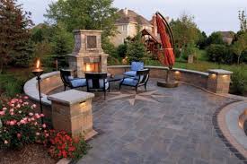 Patio With Fireplace And Surrounding Walls By Unilock With Richcliff Paver Photos Backyard Fireplace Patio Patio Fireplace