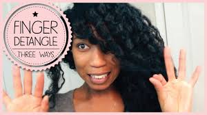 A curling iron or curling wand: Finger Combing Natural Hair How It Can Save Your Strands