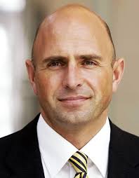 Former CEO of Failed U.K. Bank Sticks to Finance, Cricket Postcrisis