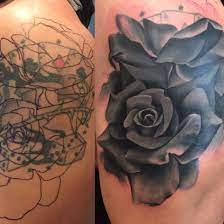 101 Best Rose Tattoo Ideas For Women Tattoo Ideas In 2021 Rose Tattoo Cover Up Cover Tattoo Cover Up Tattoos