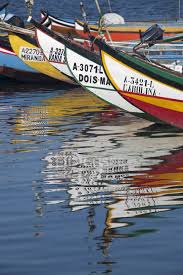 Check out the wide range of accommodation are you looking for suitable hotels in torreira? Traditional Moliceiro Fishing Boats Painted In Vivid Colors Moored In Torreira Portugal Wood Ripples Stock Photo 192694494