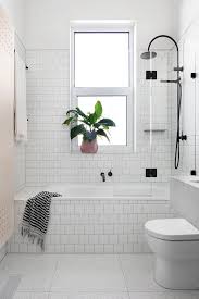 White Subway Tiles Bathtub With Black Metal Shower Of Shower Bathtub Combo In Bathroom Tub Shower Combo Bathroom Remodel Designs Small Bathroom Remodel Designs