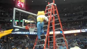 Well during this particular mascot game, the denver nuggets mascot, rocky, decided he'd had enough of being a punchline and he laid out a kid. Rocky Denver Nuggets Mascot Ladder Dunk Mp4 Youtube