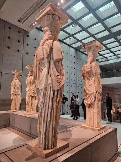 The Erechtheion Caryatids (Caryatids) are a timeless testament to classical  Greek aesthetics and engineering genius. In the enchanting atmosphere of the  Acropolis of Athens, these female-figured columns within the iconic  structure rising