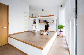 The First Floor Bedroom Features A Raised Platform With The Child S Elevated Bed Positioned Against One Wall Elevated Bed House Floor Design