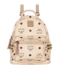 Looking at the fake gucci dionysus bag the side grooves are a Mcm X Mini Stark Bebe Boo Backpack In Beige Modesens
