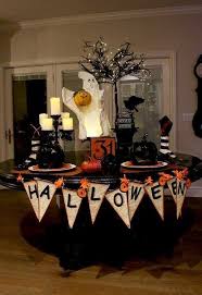 32 Bewitching Table Ideas For Your Halloween Bash Halloween Tablescape Halloween Table Decorations Halloween Table