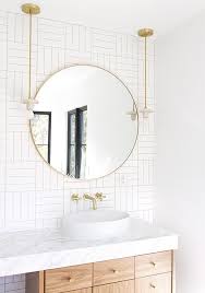 20 Ways To Style An Oversized Gold Round Wall Mirror Modern Bathroom Mirrors Modern Bathroom Bathroom Interior Design