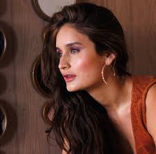 She contemplated staying home but she couldn't resist the allure of the  night. That was the thing about New York; you never knew where the night  would end or who you could