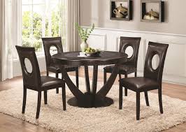 Featuring a stunning glass top table with a sleek base crafted of wood solids in a rich cappuccino finish, this stylish dining set artfully mixes multiple materials for a look that is truly unique. Stapleton 106741 Dining Set 5pc In Cappuccino By Coaster
