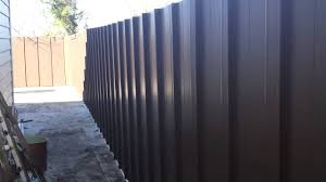 The new fence provides a shiny backdrop to your garden while blocking the neighbor's view. Building A Metal Fence Youtube