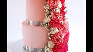 Peonies, hydrangea and cabbage roses cascade down this 4 tier ivory fondant wedding cake. Tiered Cascading Floral Cake Tutorial Rosie S Dessert Spot Youtube