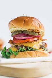 Classic Cheeseburger Recipe On Brioche With Lettuce Tomato And Onions Recipe Classic Cheeseburger Recipe Cheeseburger Recipe Best Beef Recipes