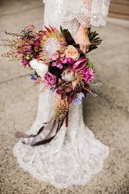 Cascading wedding bouquets bride bouquets flower bouquet wedding floral wedding spring wedding colors winter wedding flowers spring wedding inspiration spring weddings summer. Urban Boho Wedding At Madart Studio In Downtown Seattle Junebug Weddings Cheap Wedding Flowers Fall Wedding Bouquets Wedding Flower Girl Basket