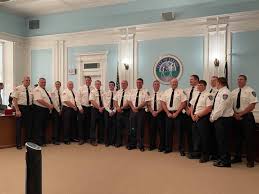 Captain Steve Himes being sworn in as...