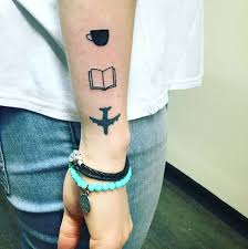 In this first tattoo guide, we go over how to book your first tattoo appointment by laying everything out step by step. Black And White Simple Design Cup Open Book And Plane Forearm Tattoo Tattooimages Biz