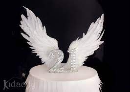 It's my first attempt in making the angels and they turned out okay so i wanted to share this with all. Wafer Paper Wings Wings Cake Wafer Paper Flowers Angel Wings Cake